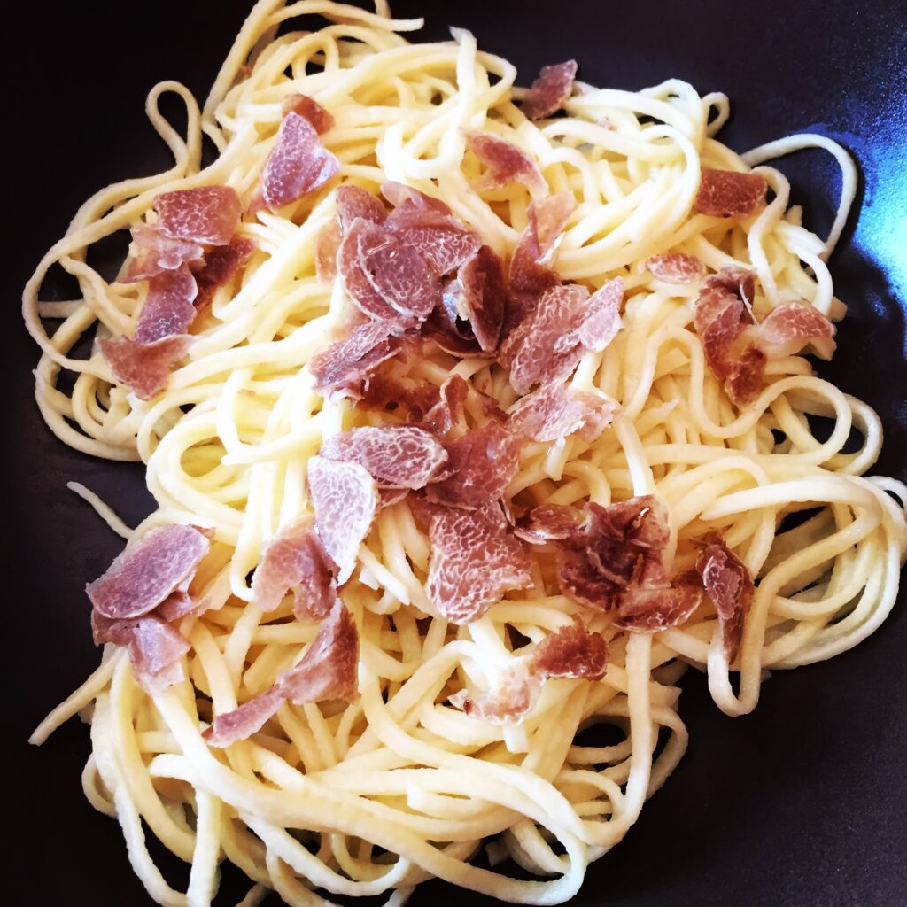 piedmont food & wine tour homemade pasta tajarin white truffles shaved