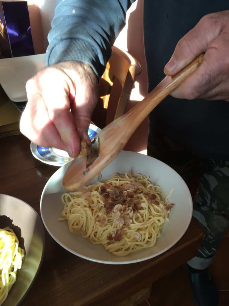piedmont food & wine tour shaving white truffles