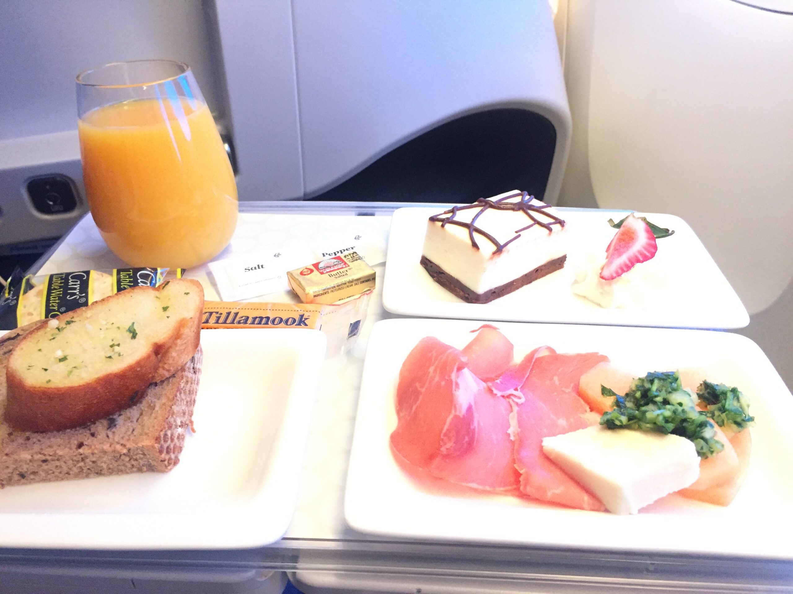 food on a tray on a plane