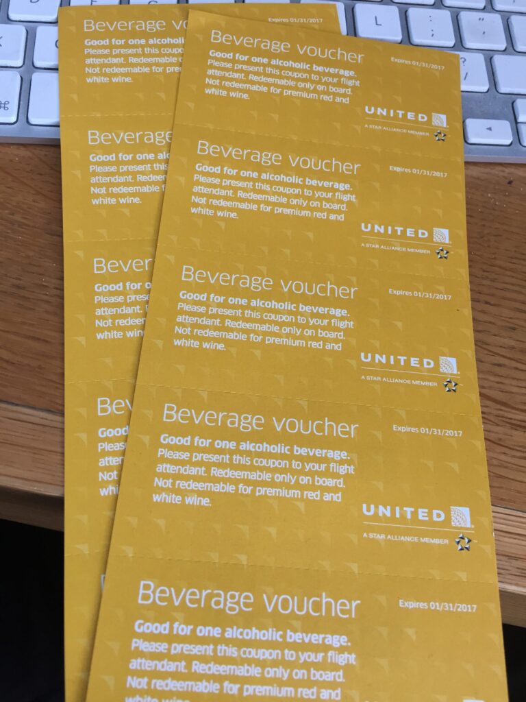 a stack of yellow paper vouchers