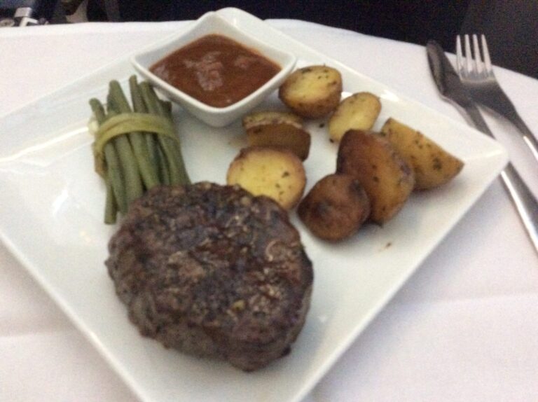 a plate of food with a sauce on it