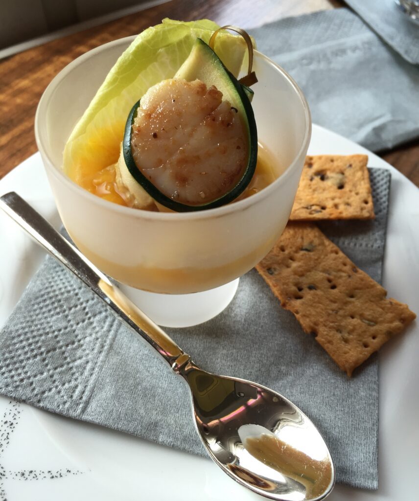 cathay pacific first class hong kong to new york amouse bouche scallop