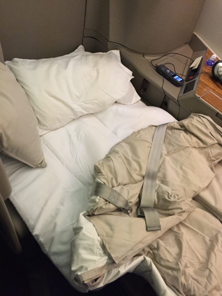 cathay pacific first class hong kong to new york bed