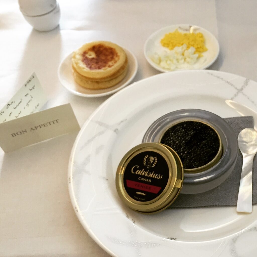 cathay pacific first class hong kong to new york dinner setup card