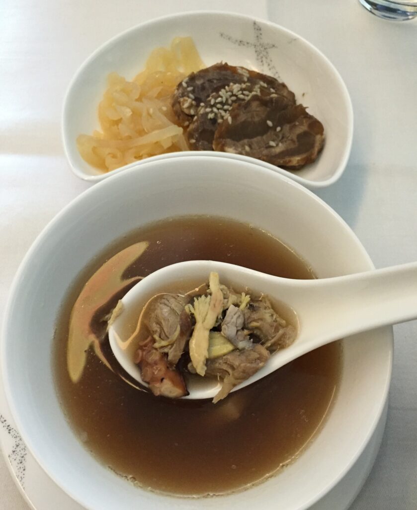 cathay pacific first class hong kong to new york soup