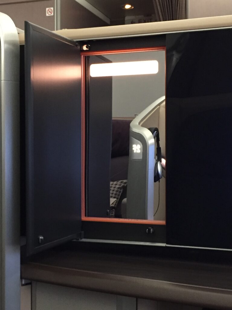 ingapore airlines first class san francisco to hong kong seat mirror