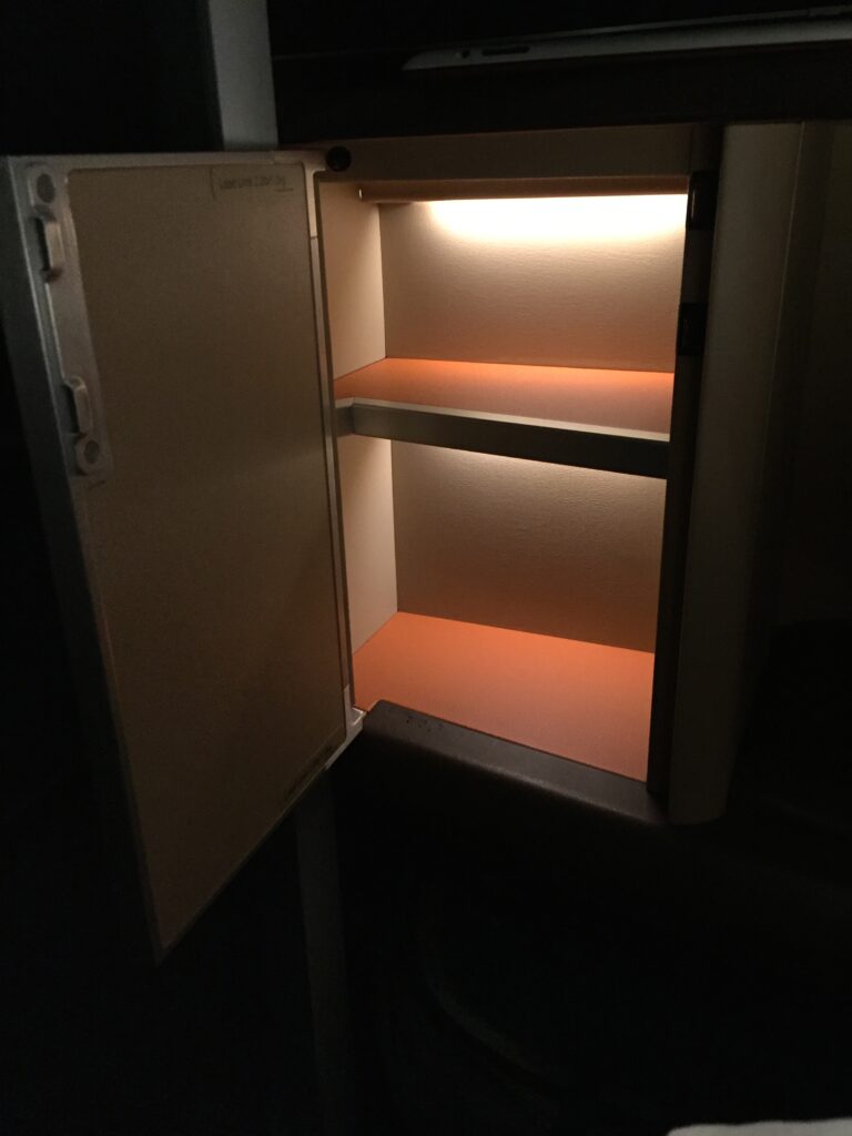 ingapore airlines first class san francisco to hong kong small cabinet