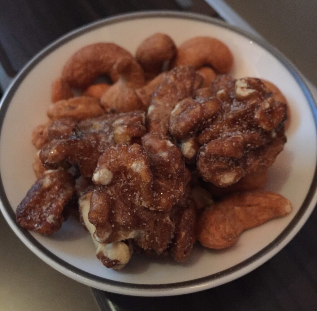 singapore airlines first class san francisco to hong kong candied nuts