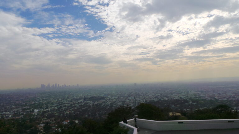a view of a city from a hill