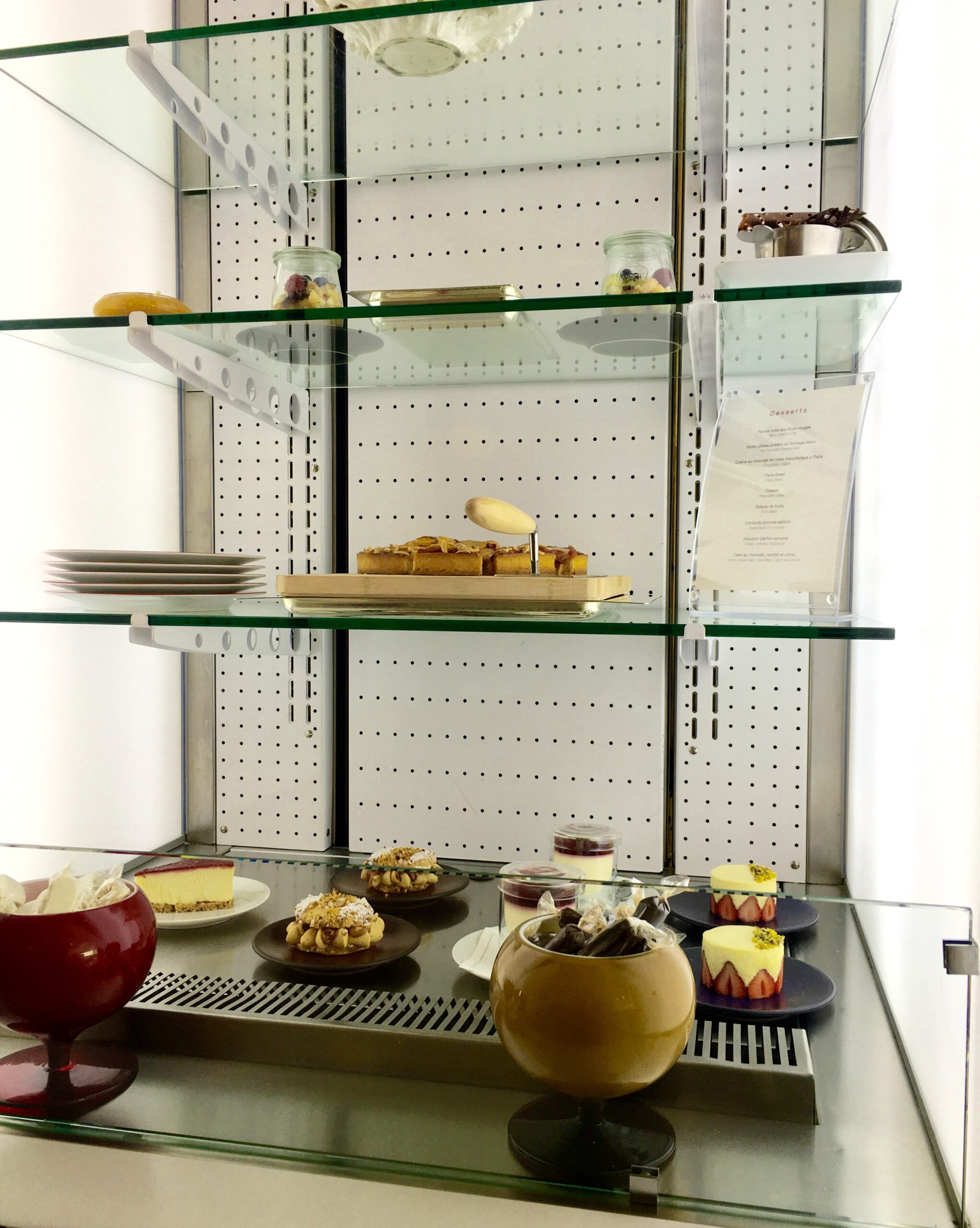 a display case with food on shelves