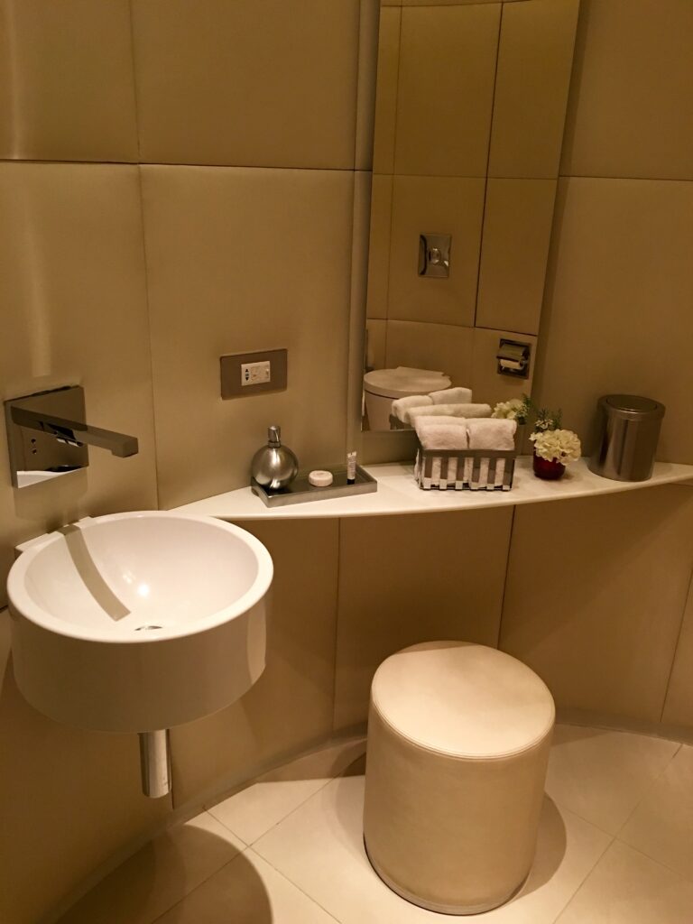 a sink and a mirror in a bathroom