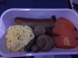 a white container with food on it