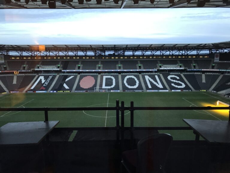 a football field with a sign on it