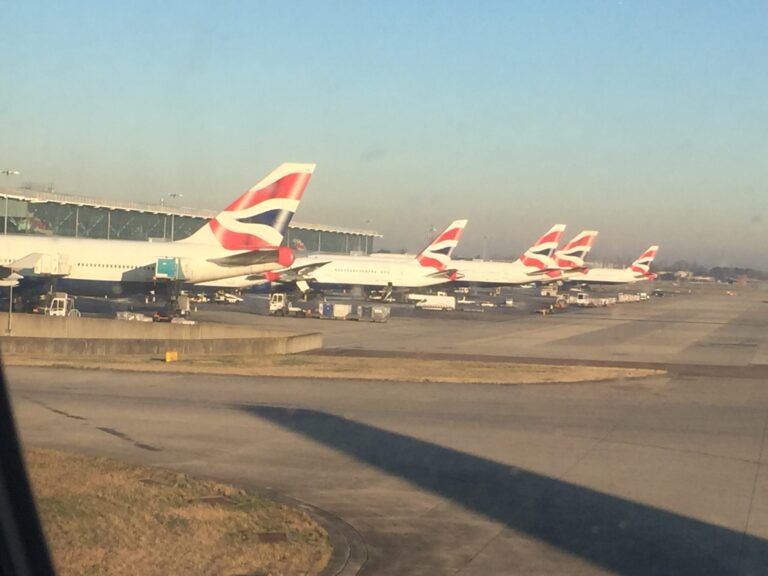 airplanes parked at an airport