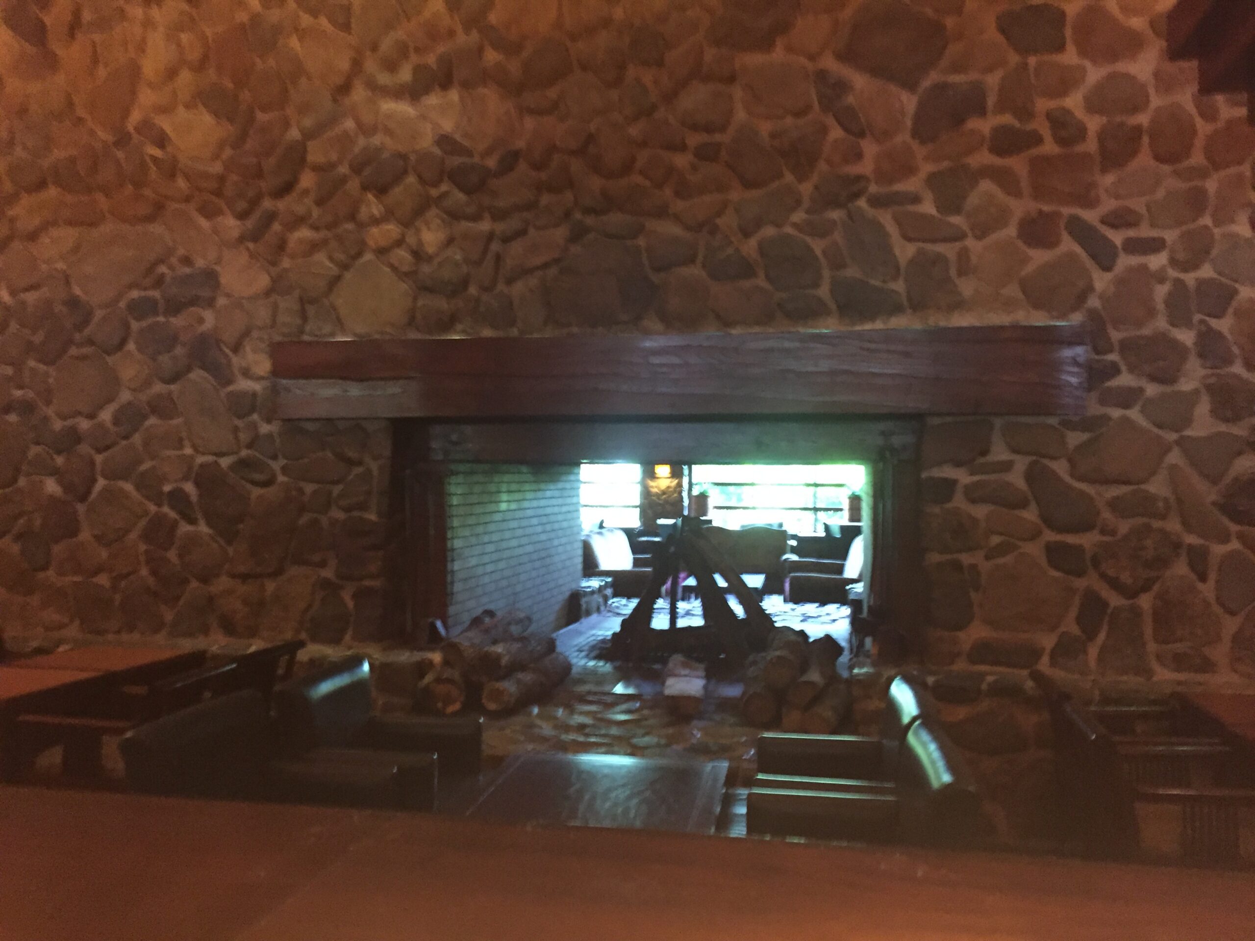 a fireplace in a stone room