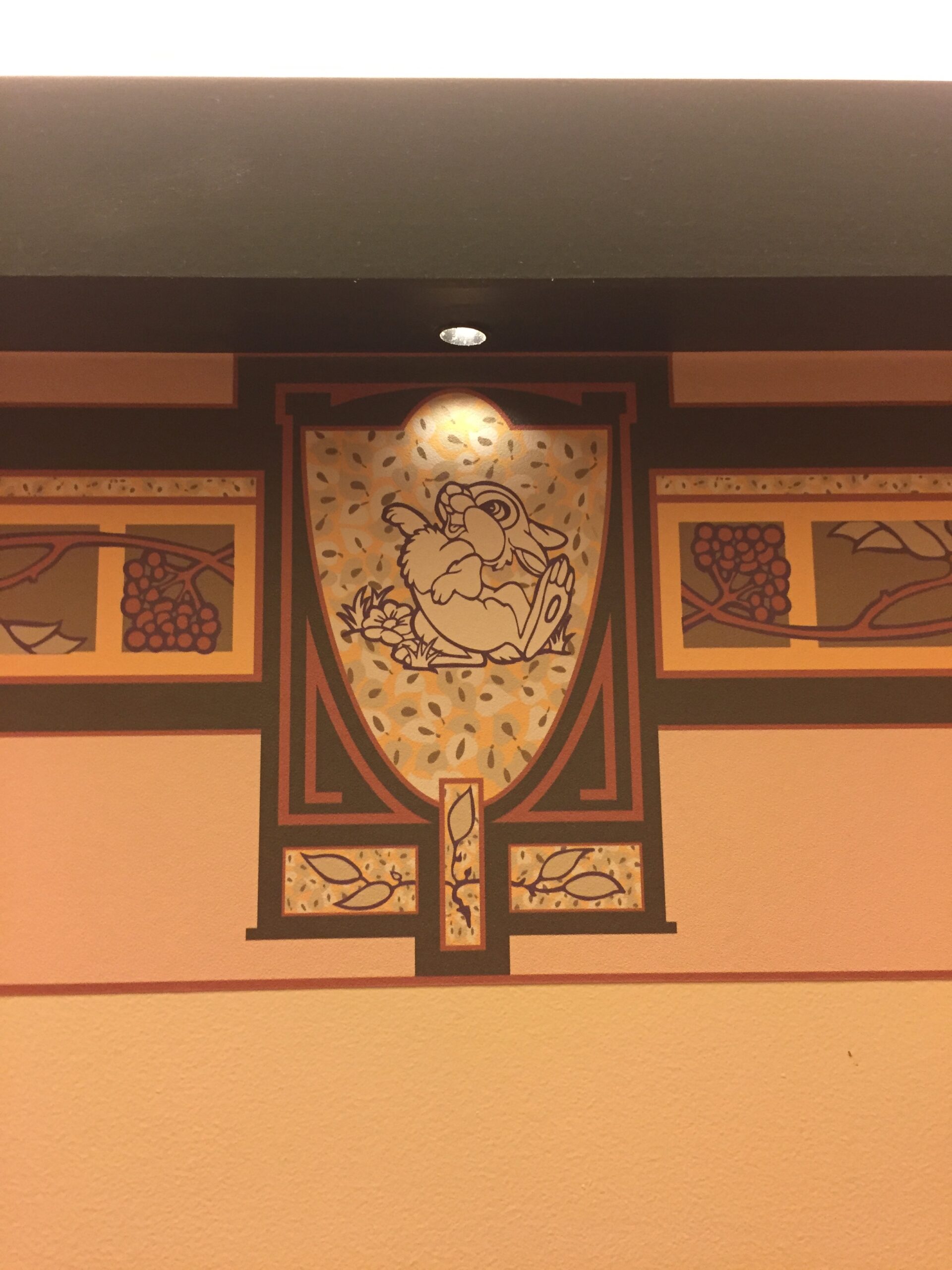 a wall with a painting on it