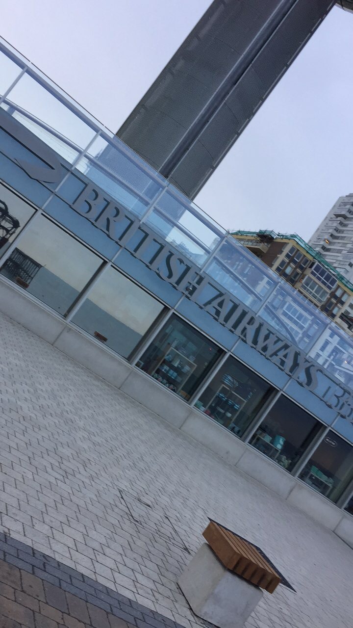 a building with a glass wall