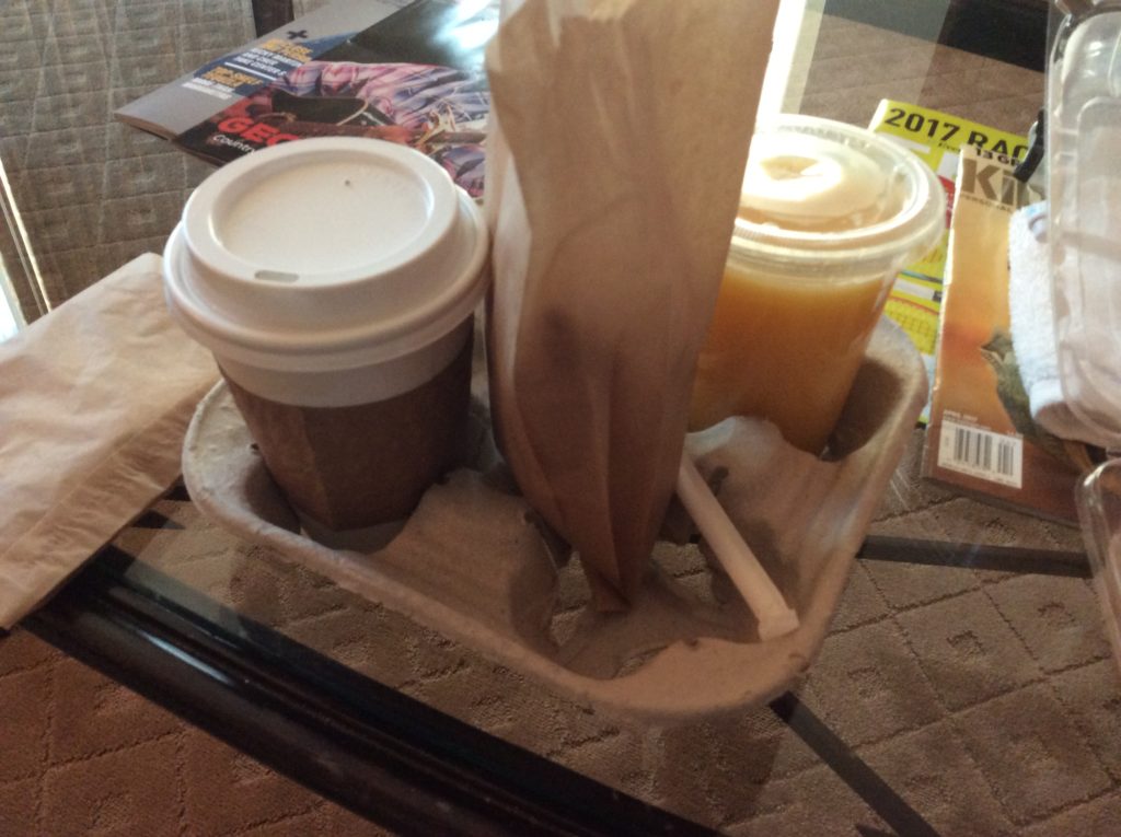 a tray of food and drinks on a table