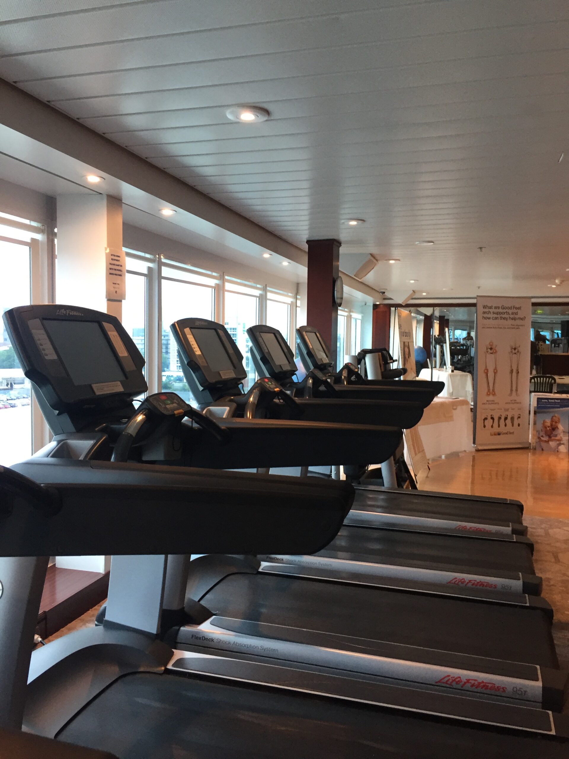 a row of treadmills in a gym