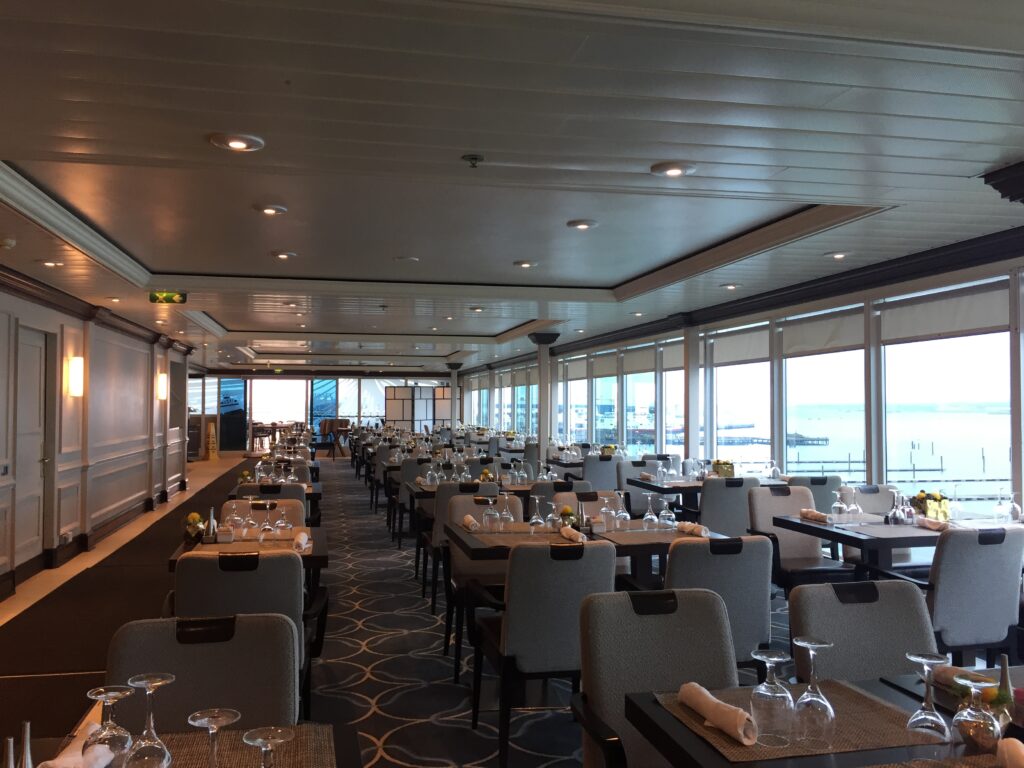 a large room with tables and chairs