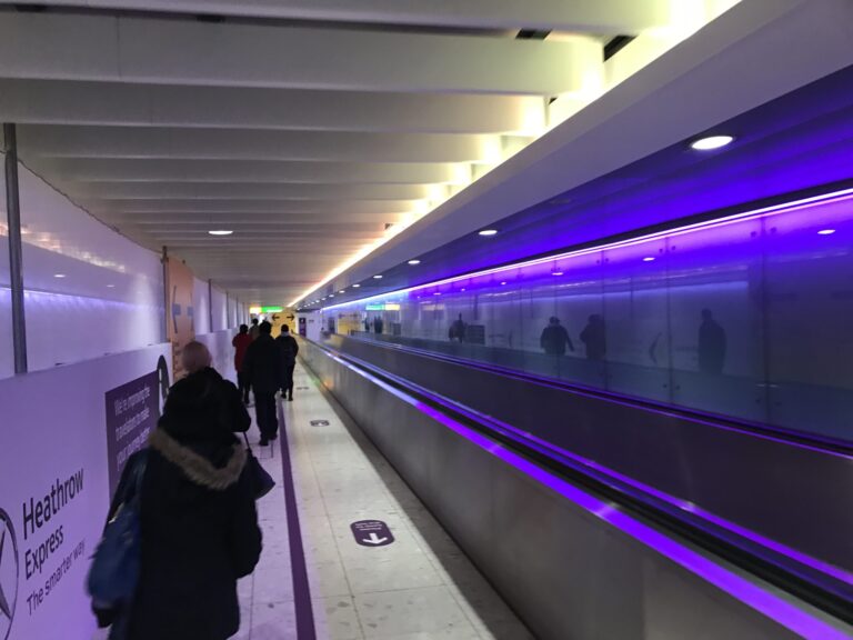people walking on a walkway
