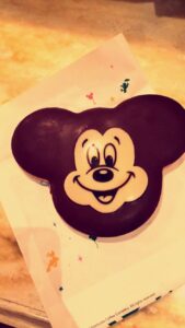 a chocolate mouse head with a face on it