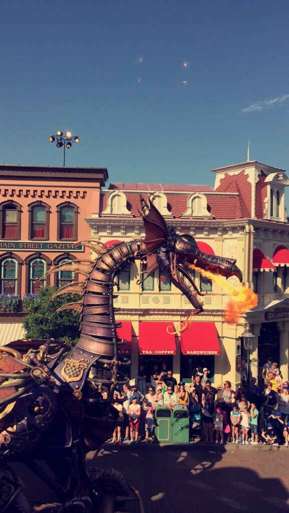 a dragon with fire coming out of its mouth