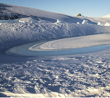 a river in the snow