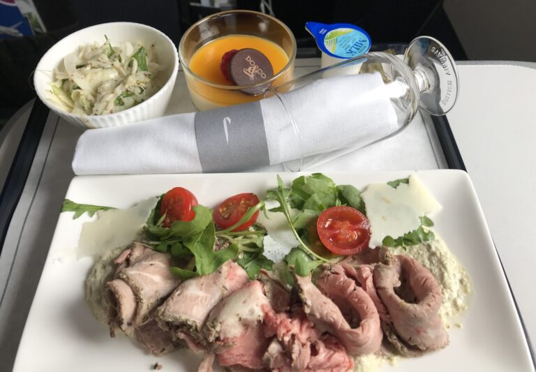 a plate of food on a tray