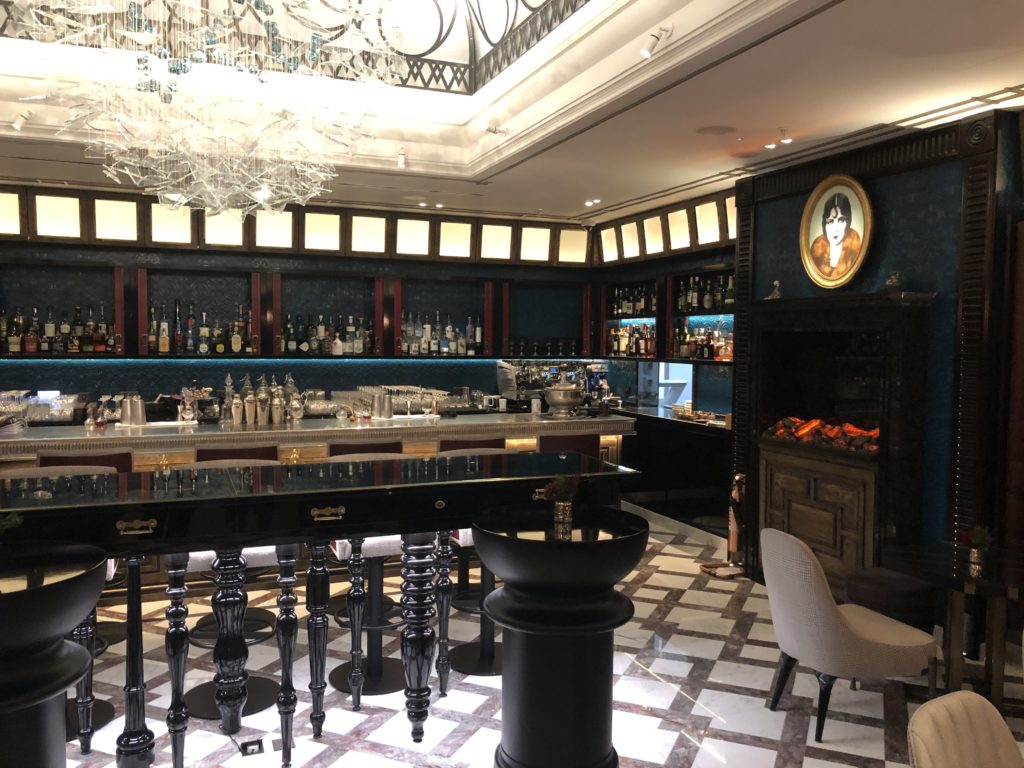 a bar with a black bar and a black counter