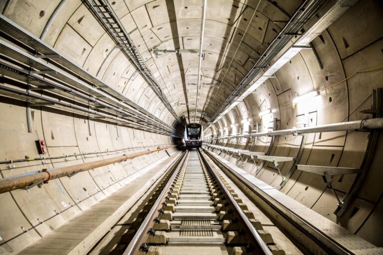 a train tracks in a tunnel